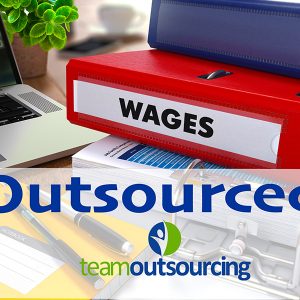 Cluttered desk on pay day solved by outsourcing
