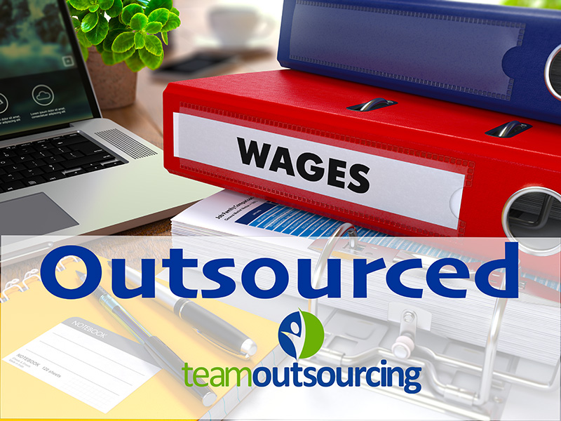 Cluttered desk on pay day solved by outsourcing